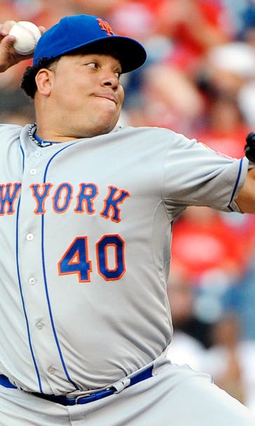 Colon joins 200-victory club, Mets hang on to edge Phillies